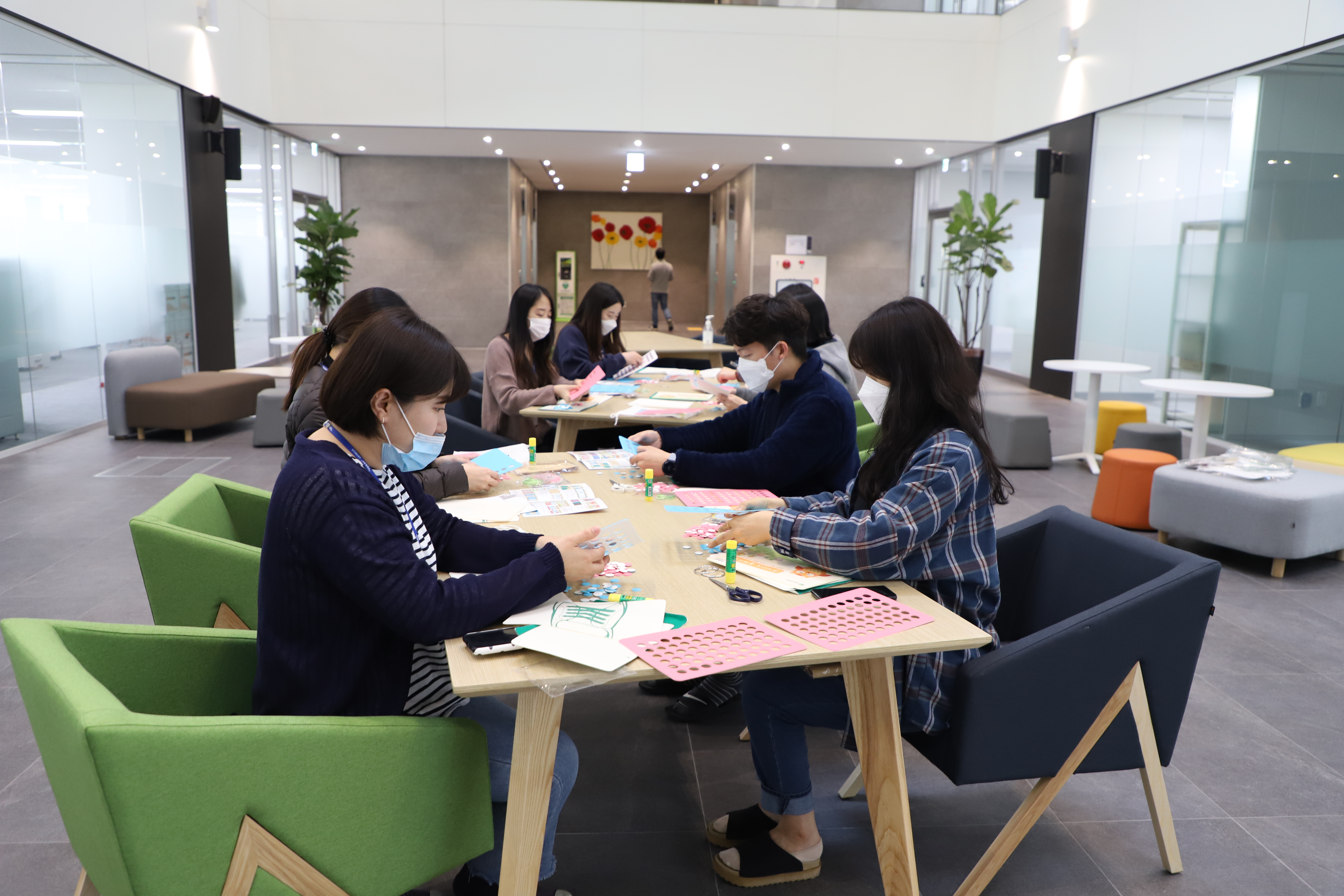 TAK delivers braille posters to blind children